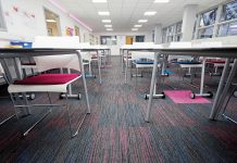 Permanently tacky film for carpet tiles