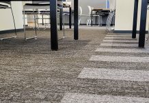Rawson Carpet Solutions elevate grammar school with innovative riven and earth creation carpet tile designs